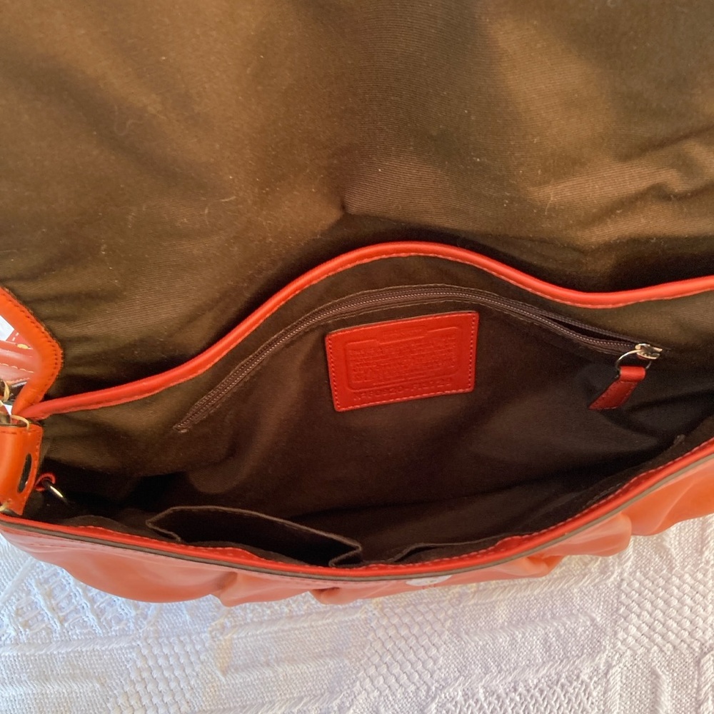 Coach SoHo, Burnt Orange Leather Shoulder Bag EUC, picture 8 shows a tiny dot - Picture 10 of 13
